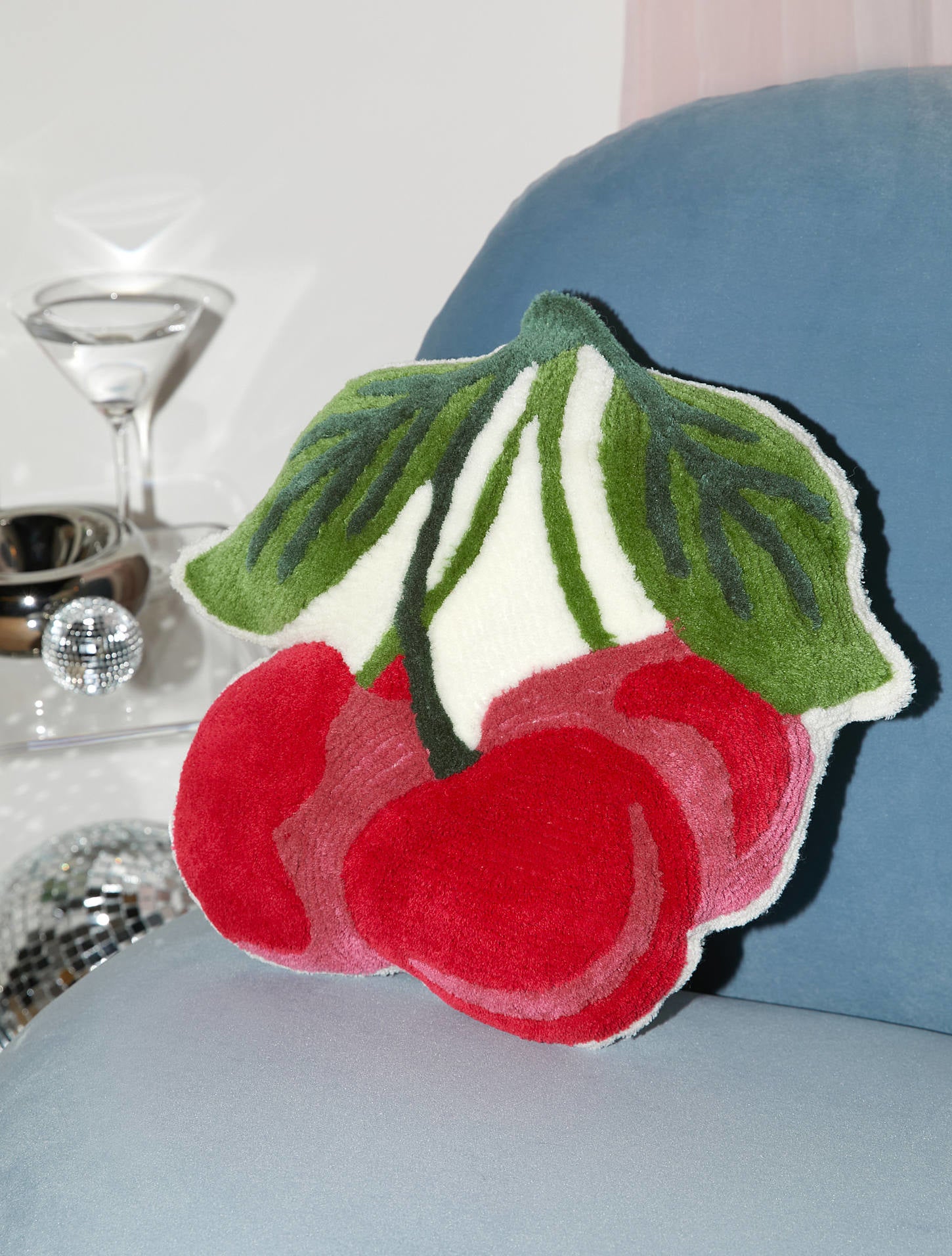 cherry-shaped tufted pillow
