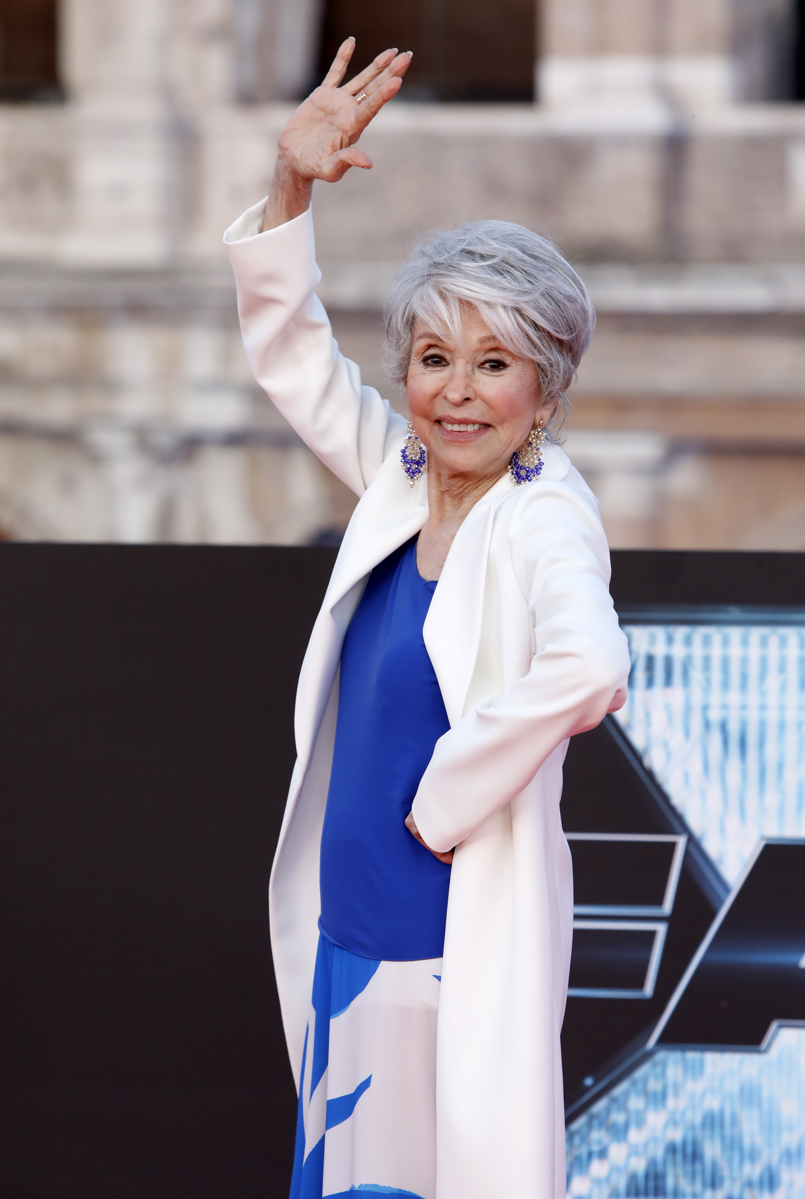 Closeup of Rita Moreno waving