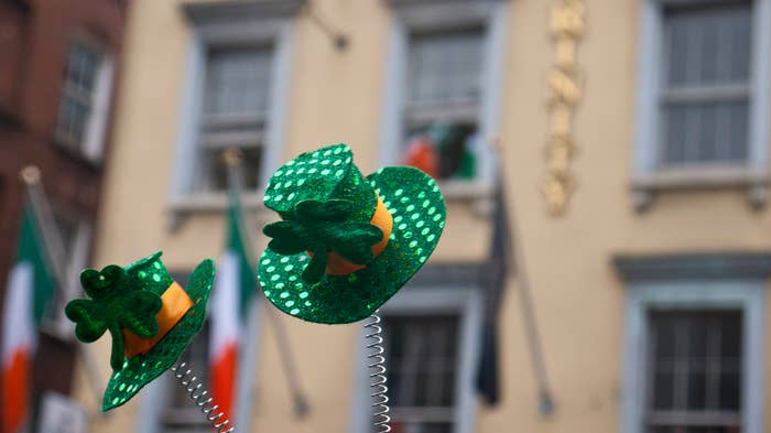 St. Patrick&#x27;s Day decorations with shamrock motifs on display in a city setting, celebrating Irish culture