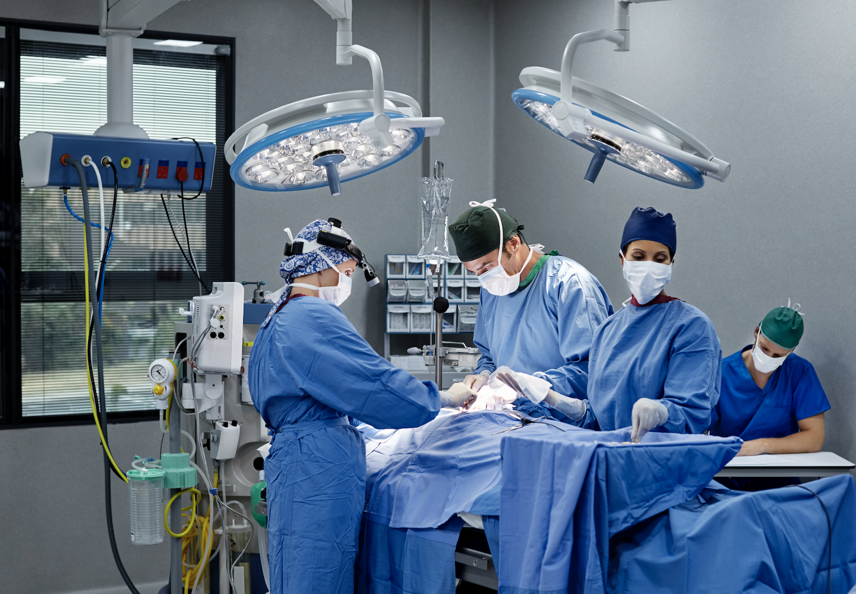 Medical team performing surgery in an operating room