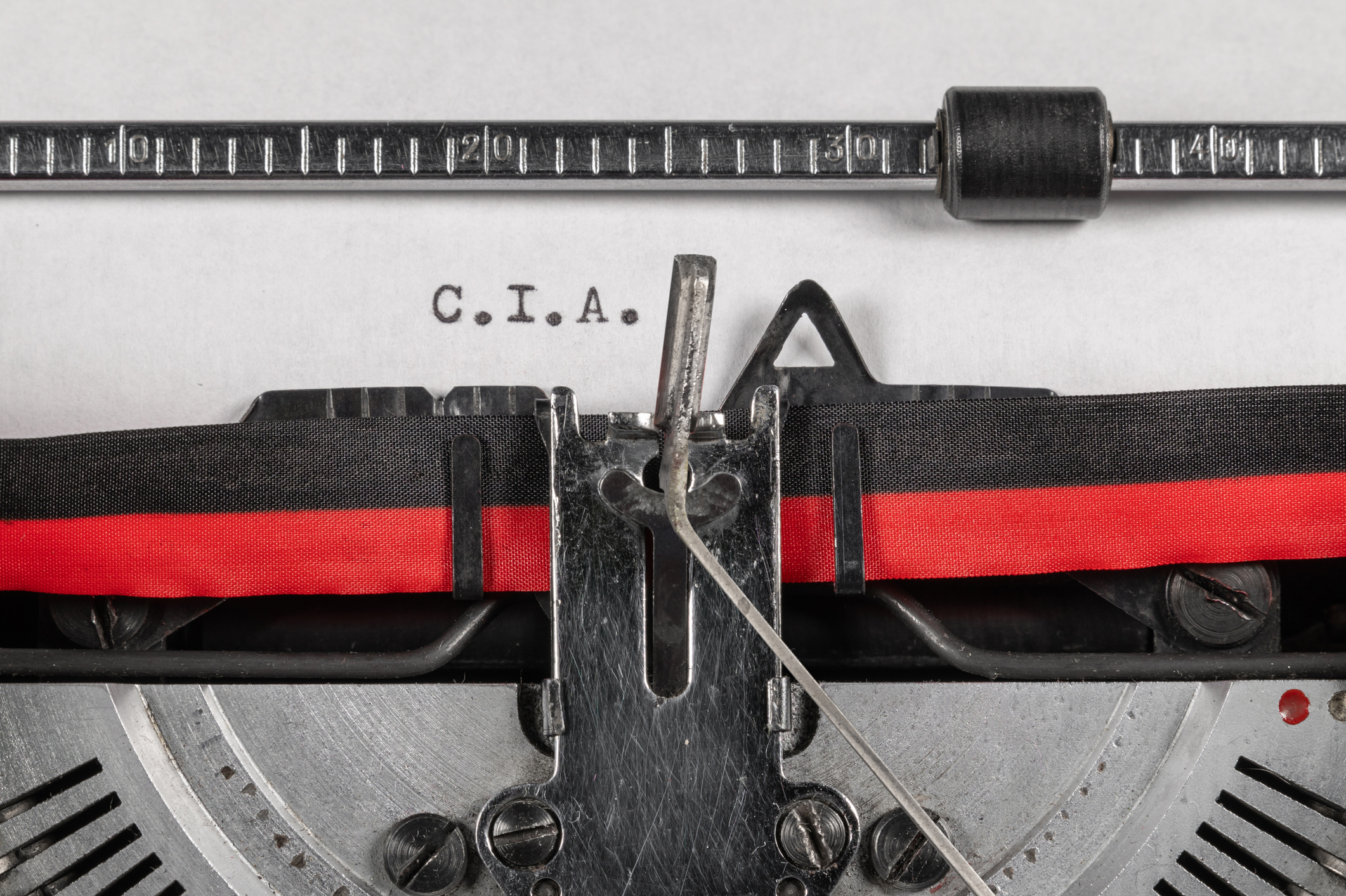 Typewriter with paper showing text &quot;C.i.A.&quot; as if in the process of typing