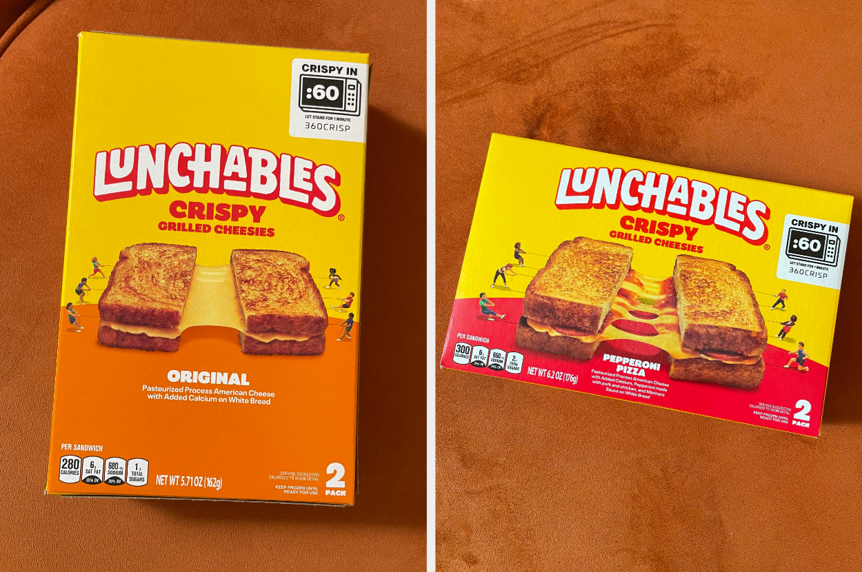 Two Lunchables Crispy Grilled Cheesies boxes featuring Original and Pepperoni Pizza flavors on an orange surface