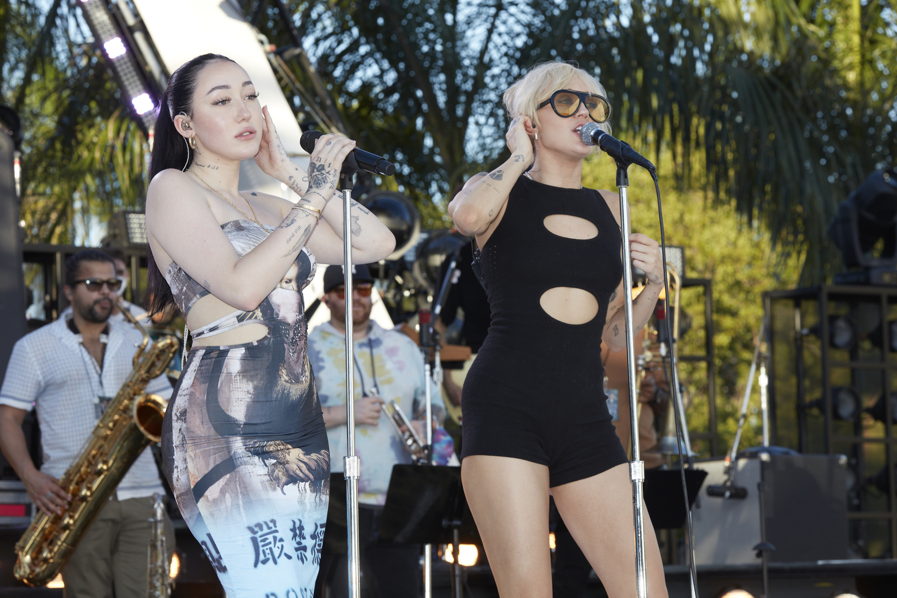 Noah and Miley onstage performing together