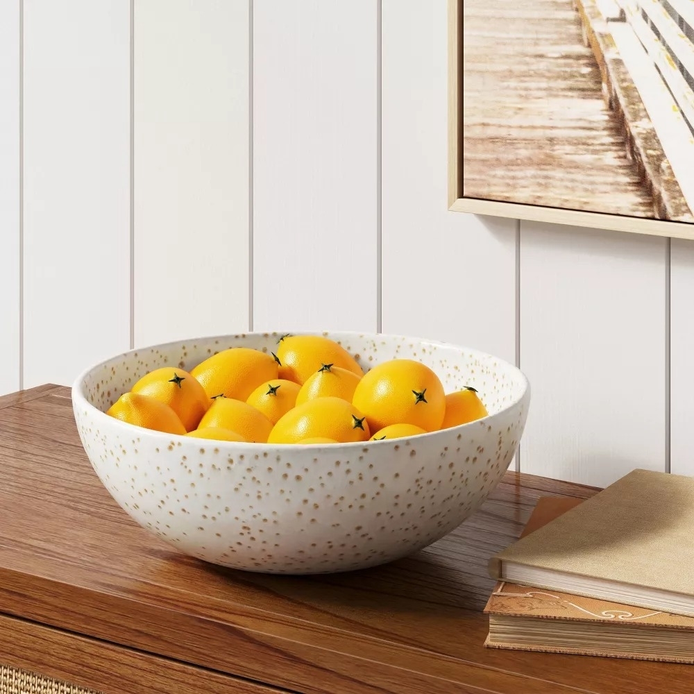 the lemons on display in a decorative bowl