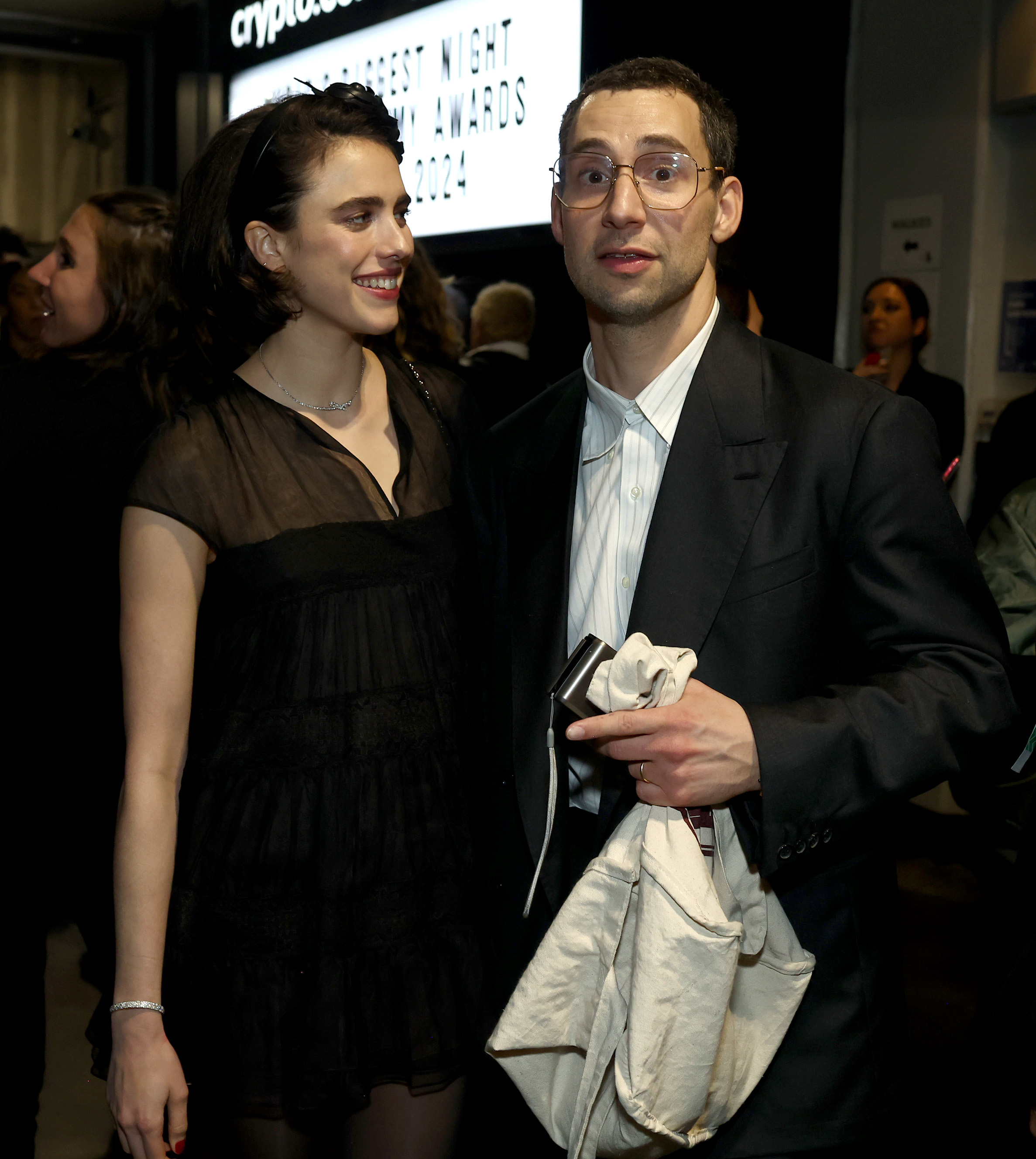 Margaret Qualley and Jack Antonoff backstage at the Grammys
