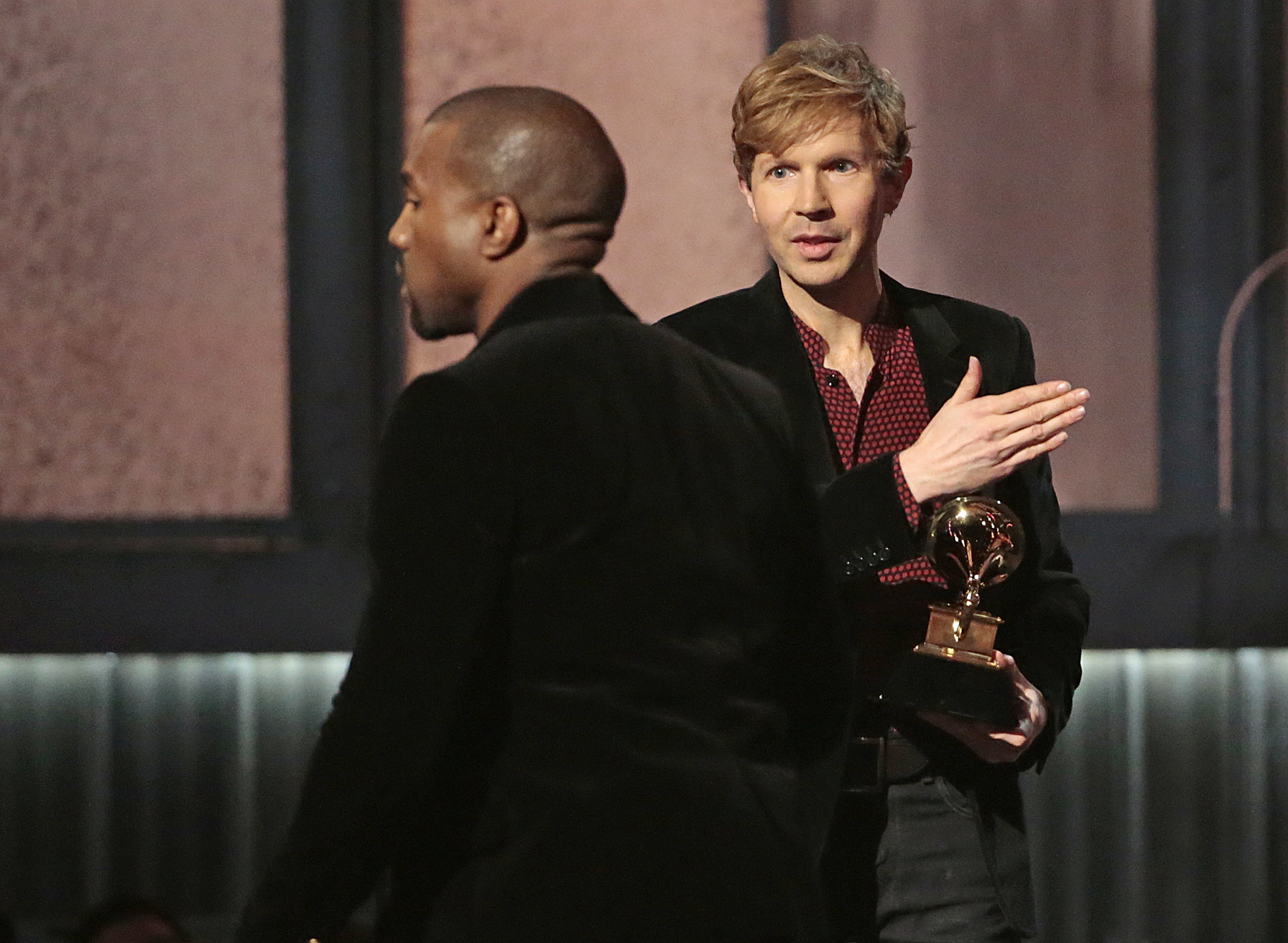 Kanye West and Beck onstage at the Grammys