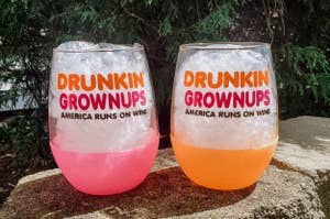 Wine glasses with the dunkin logo that say "drunkin grownups: america runs on wine" 