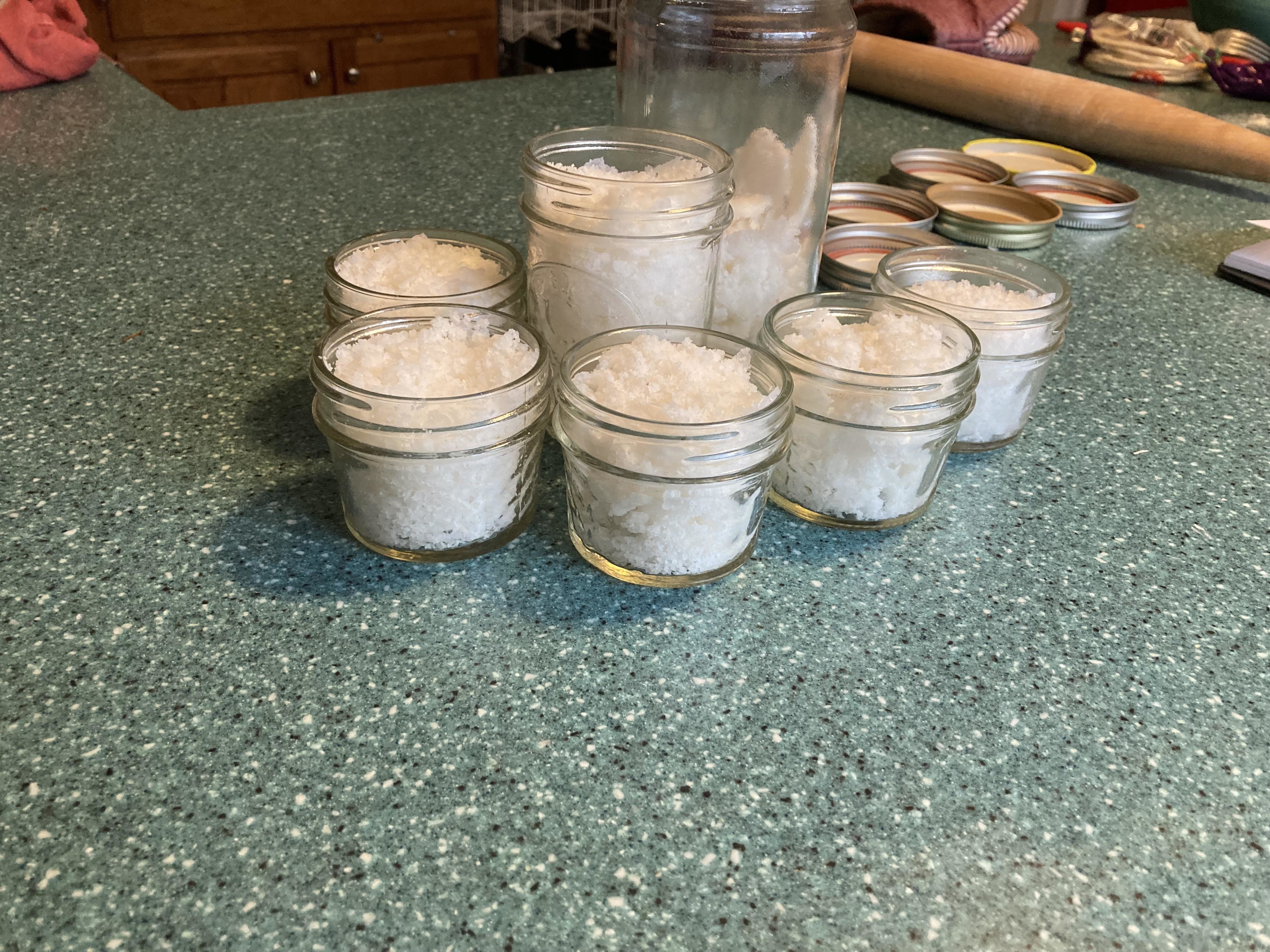 Seven jars of salt crystals