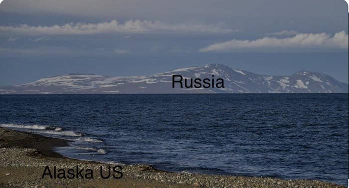 Mountains of Russia visible across the water from the Alaska shore