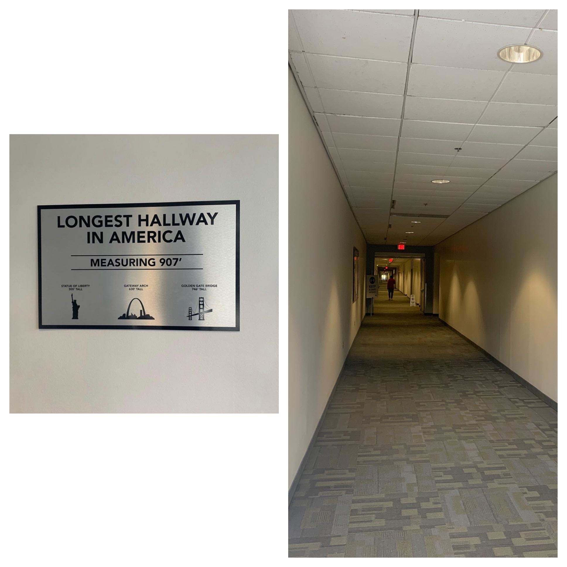 A long hallway with a sign at the start of it saying &quot;Longest Hallway in America / Measuring 907 feet&quot;