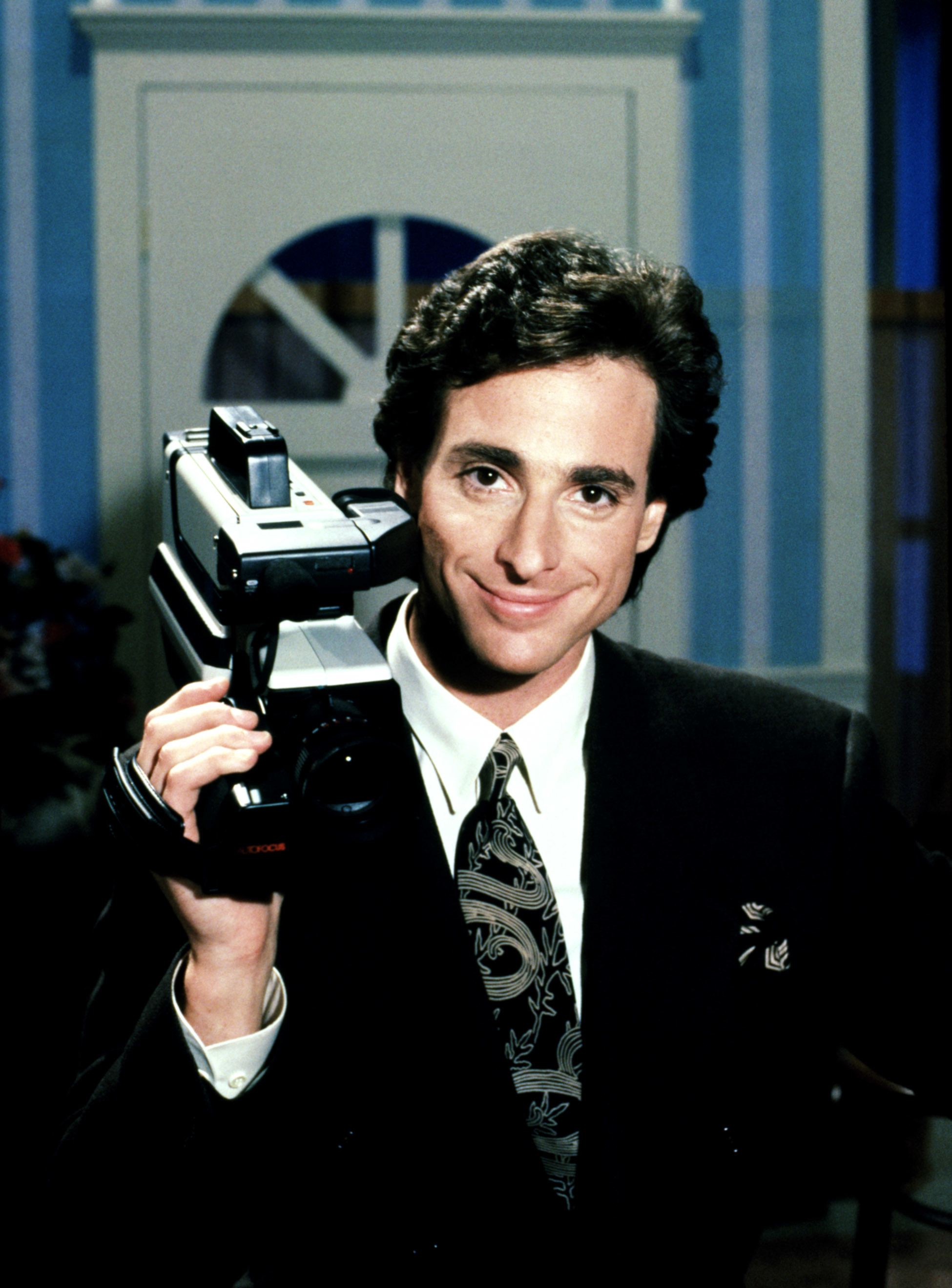 bob holding up a large camcorder