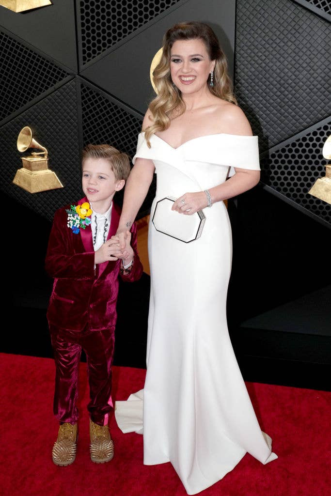 Kelly Clarkson holding hands with her son Remy