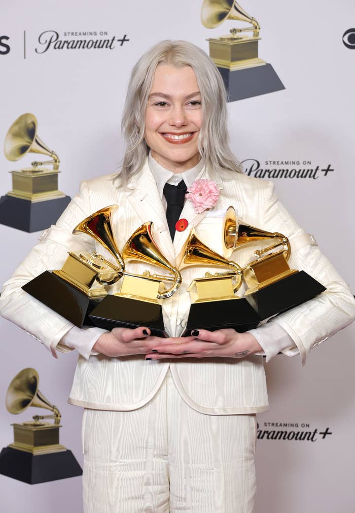 Closeup of Phoebe Bridgers holding her Grammys