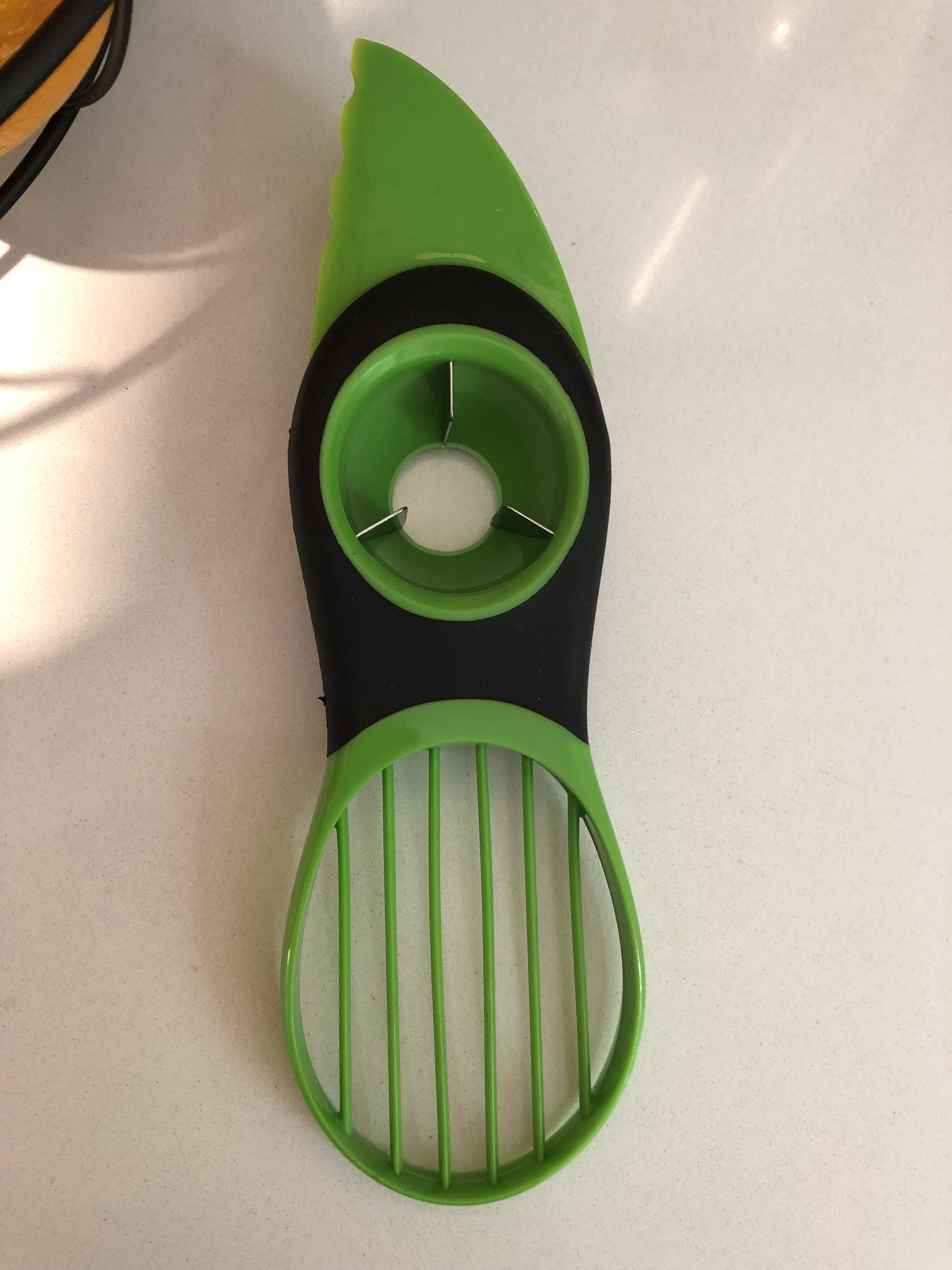 A tool used to cut, pit, and slice avocados