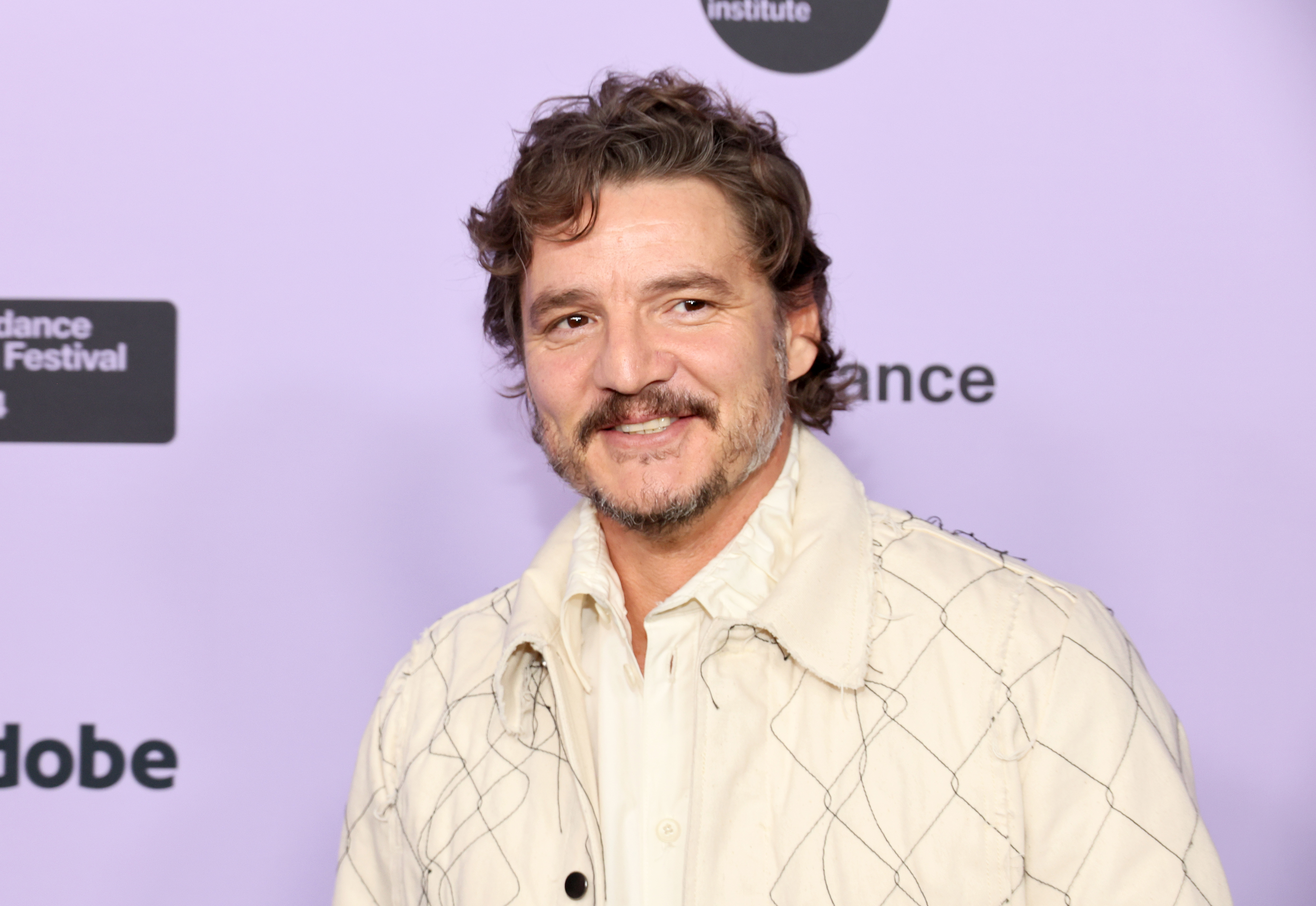 Closeup of Pedro Pascal on the red carpet