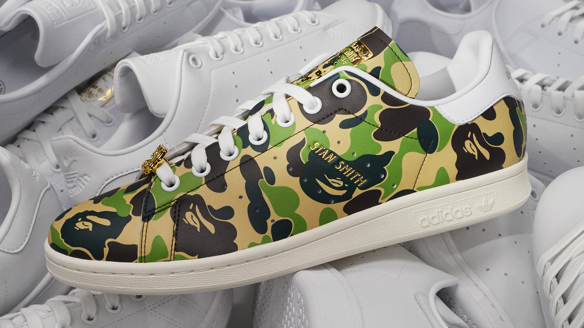 https://img.buzzfeed.com/buzzfeed-static/static/2024-02/6/16/campaign_images/aebd457151be/bape-covers-the-adidas-stan-smith-in-green-camo-5-3547-1707238449-1_16x9.jpg