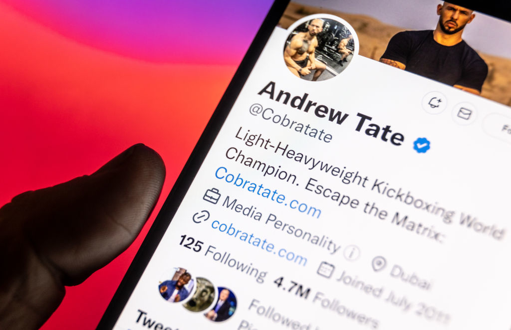Andrew Tate Twitter page on someone&#x27;s smartphone