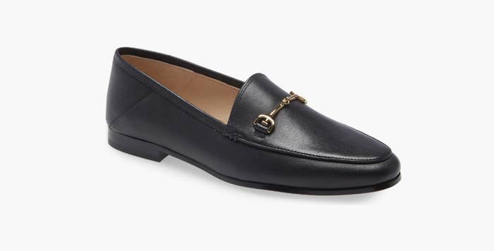 black loafers with metal detailing