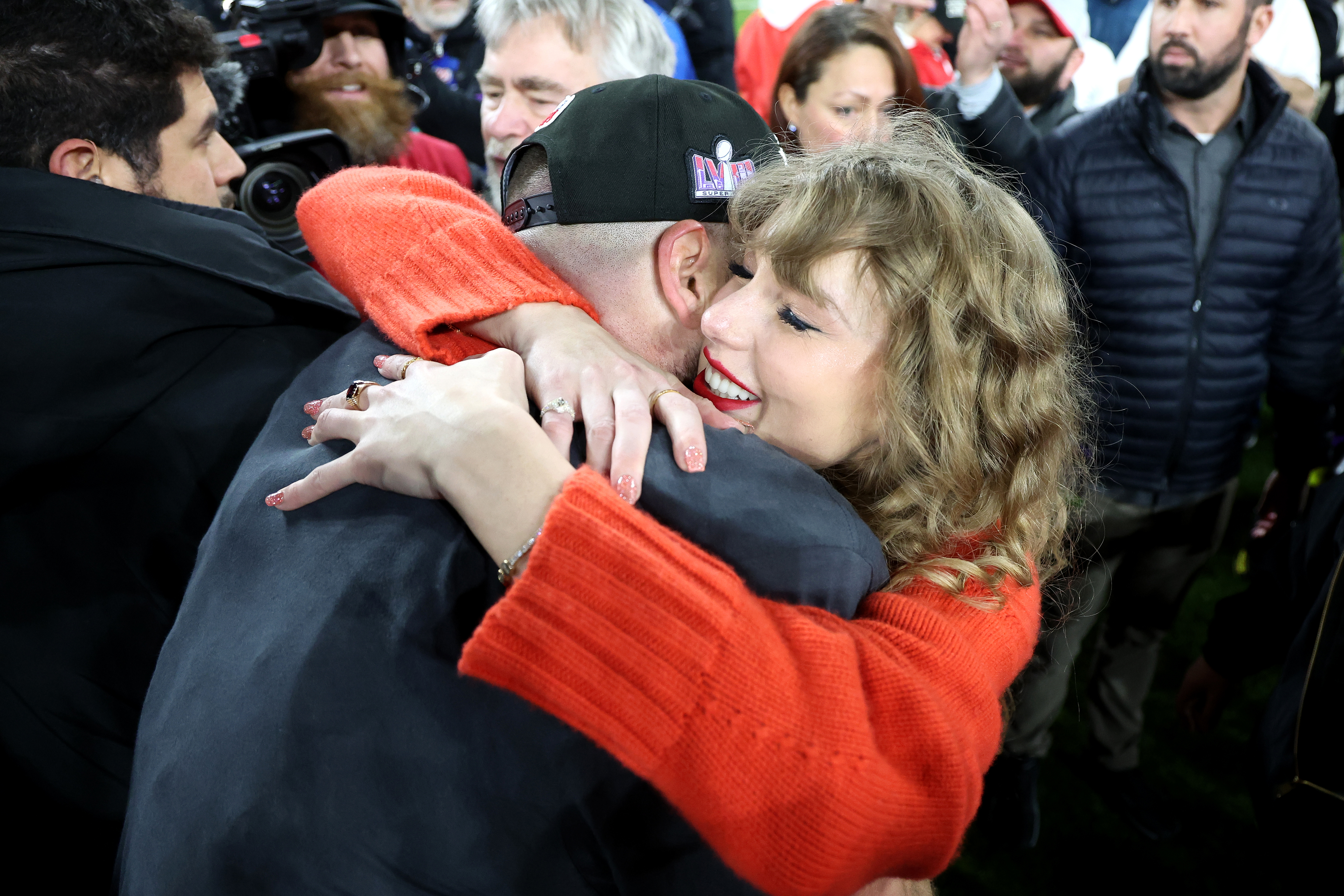 Closeup of Travis Kelce and Taylor Swift embracing