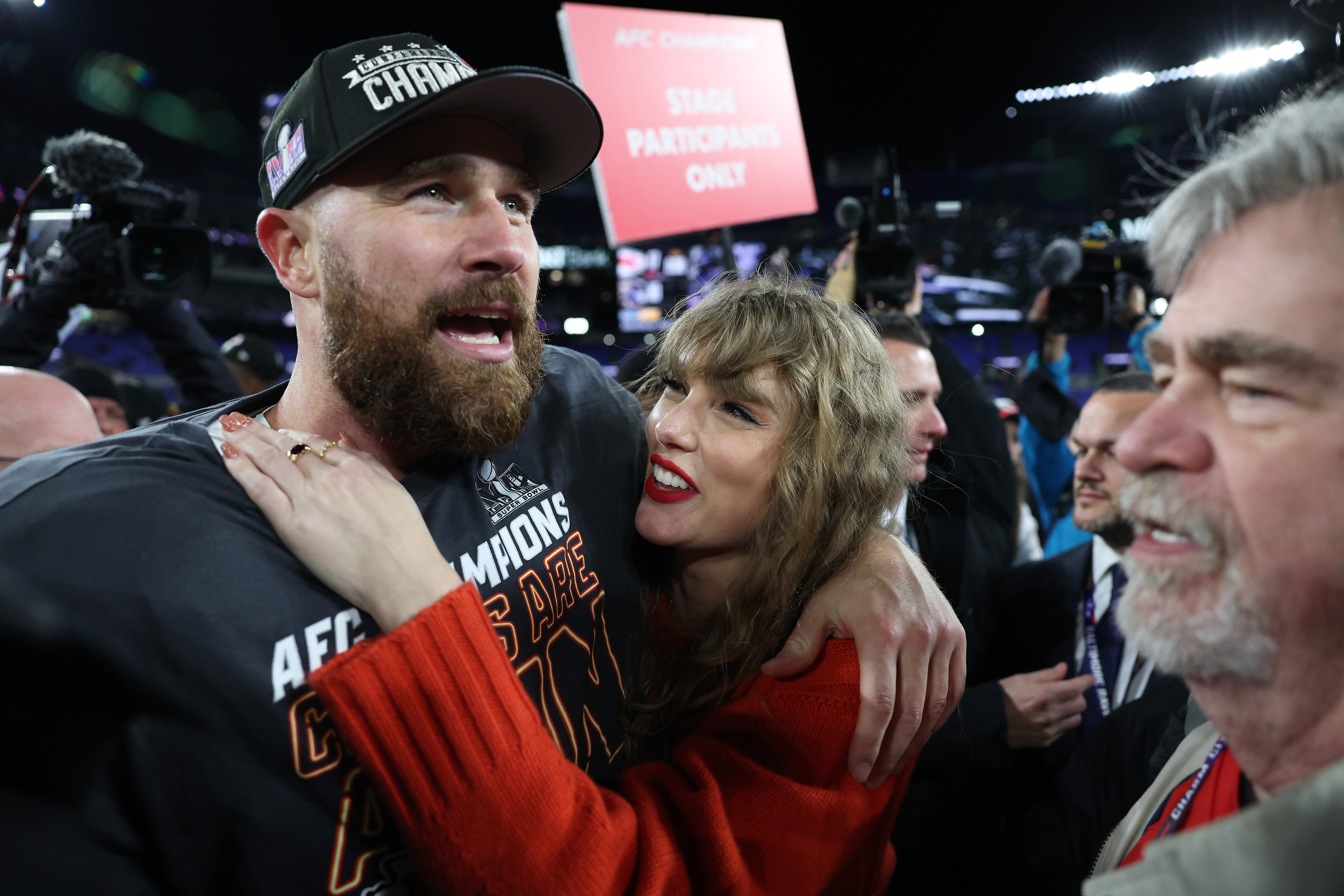 Closeup of Travis and Taylor celebrating his AFC championship