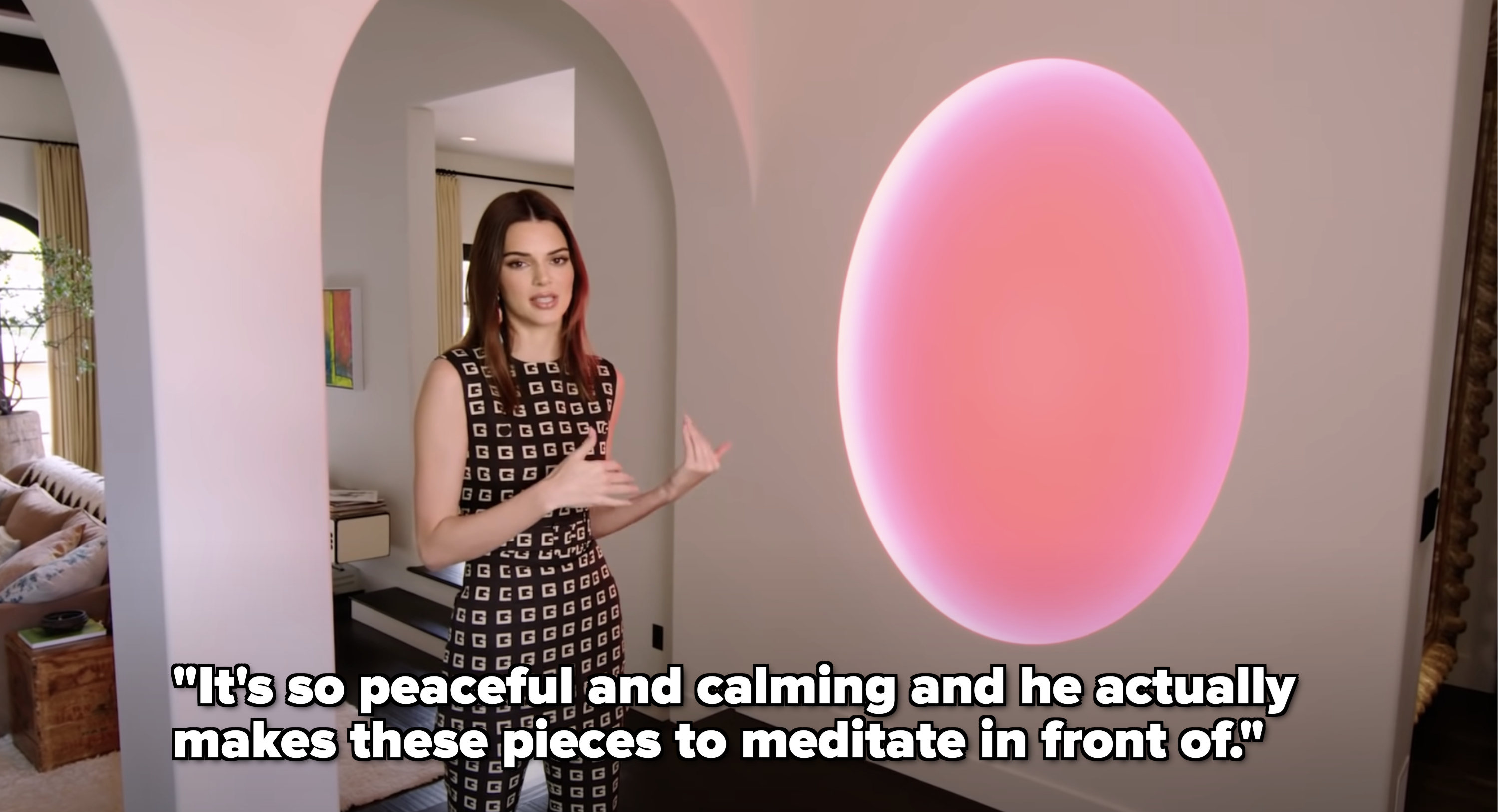 Kendall showing off her peaceful and calming art piece that is meant to meditate in front of
