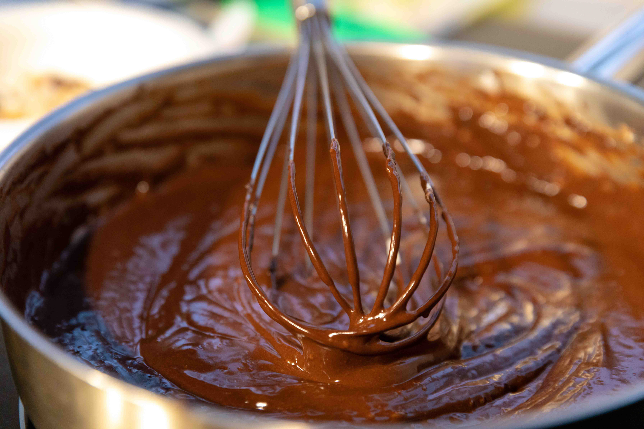 Whisking brownie mix in a bowl