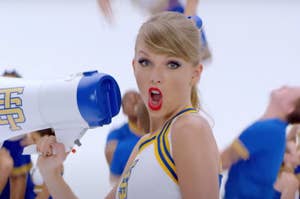 Taylor Swift dressed as a cheerleader in the "Shake It Off" music video.