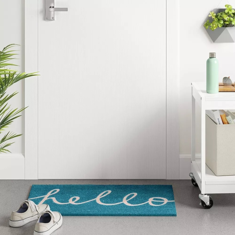 the doormat with &quot;hello&quot; written on it