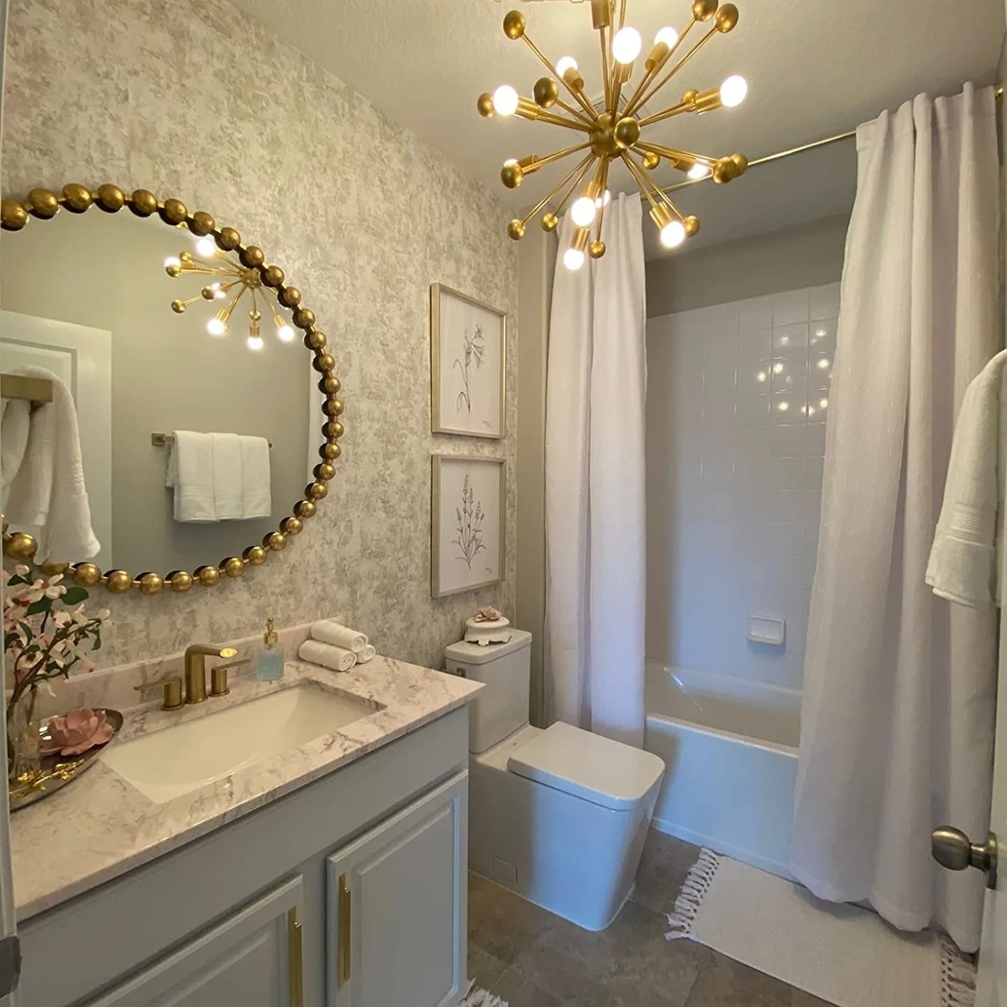 A bathroom with the wallpaper on the walls