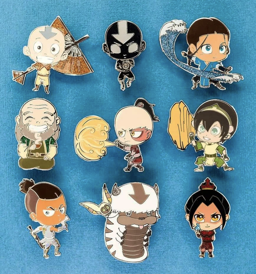 Nine pins of Aang, Aang in his Avatar state, Katara, Uncle Iroh, Zuko, Toph, Sokka, Momo and Appa, and Azula.