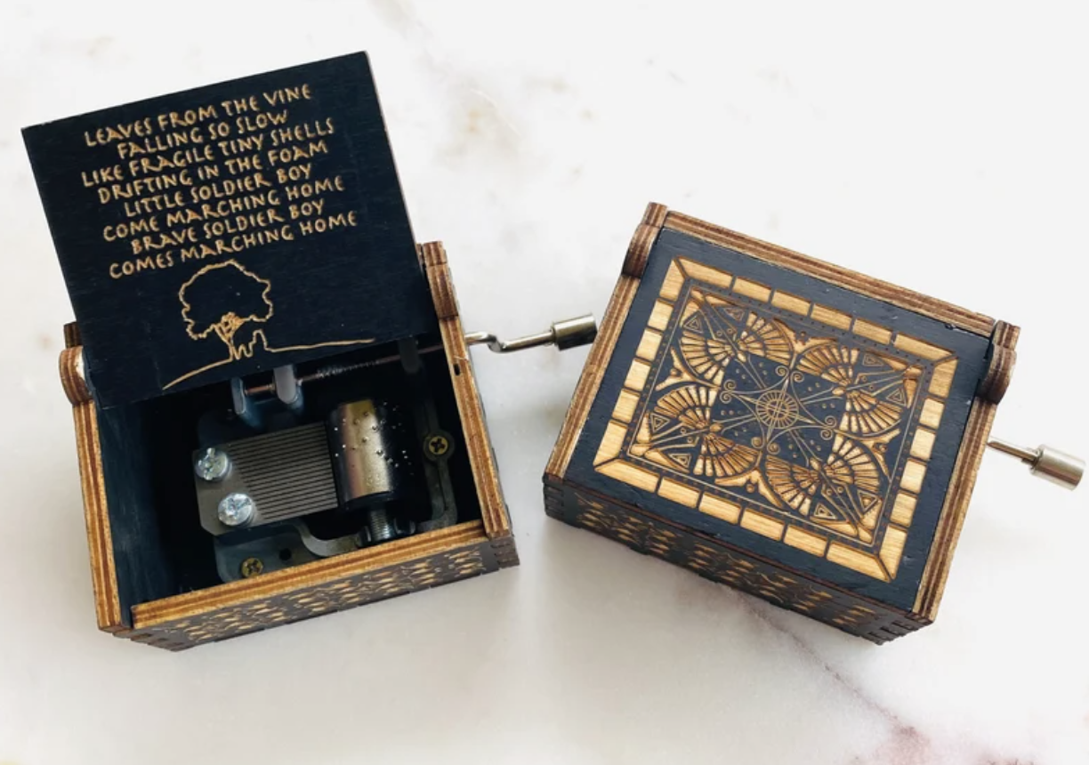 Music box with &quot;Leaves From The Vine&quot; lyrics carved.