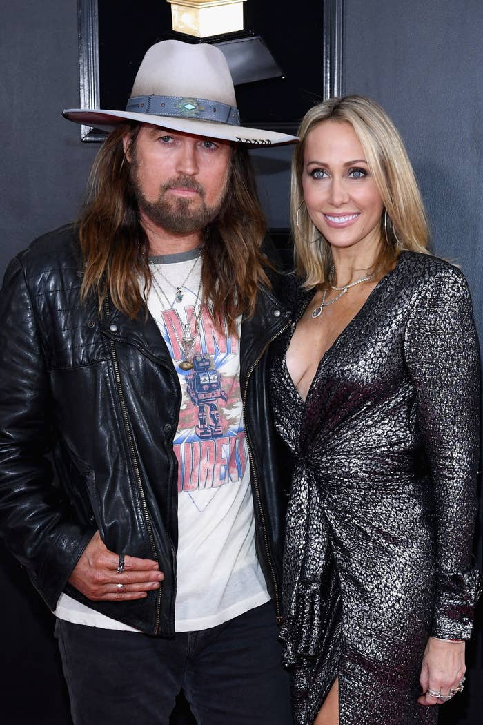 Close-up of Billy Ray and Tish smiling at a media event
