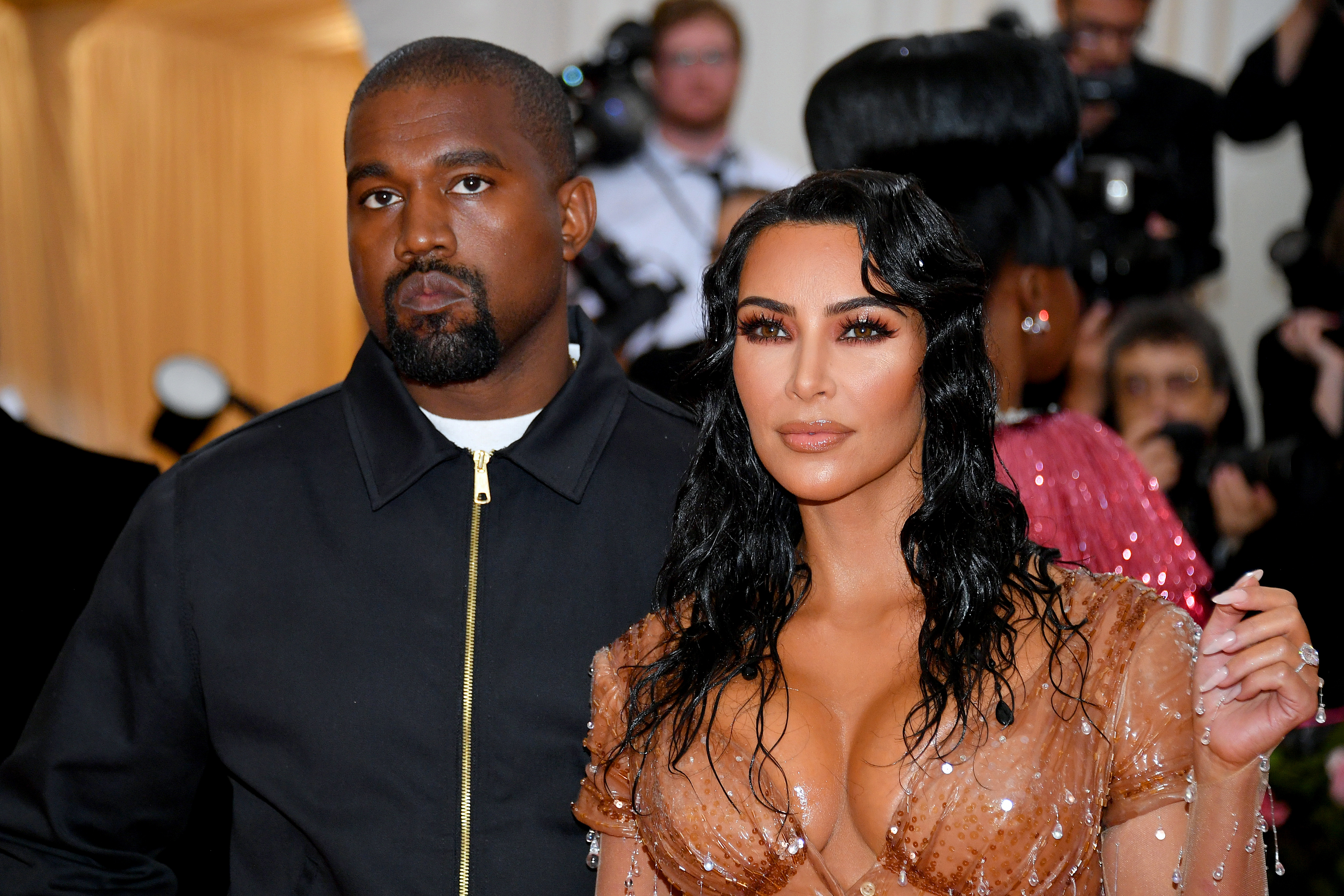 Close-up of Ye and Kim at a media event