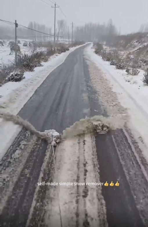 road being swiped from snow