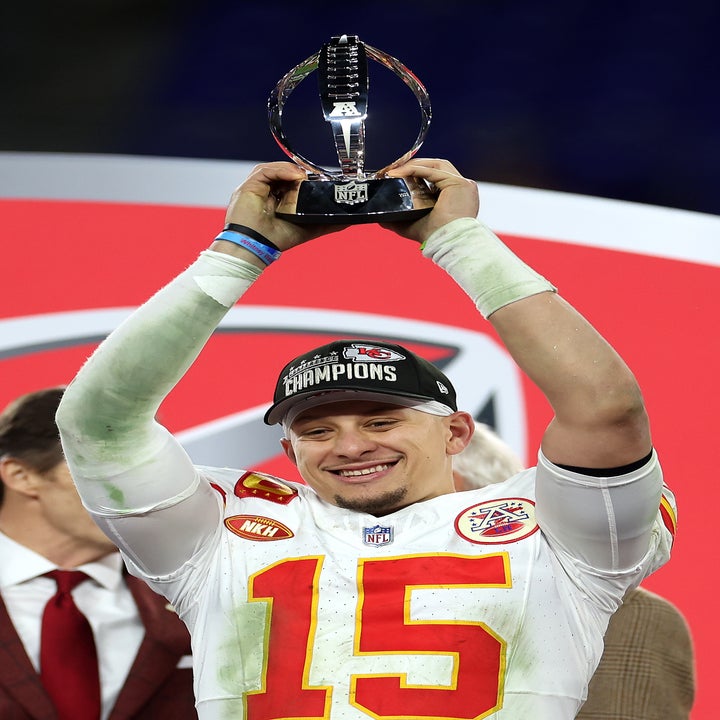 Patrick Mahomes holding a trophy