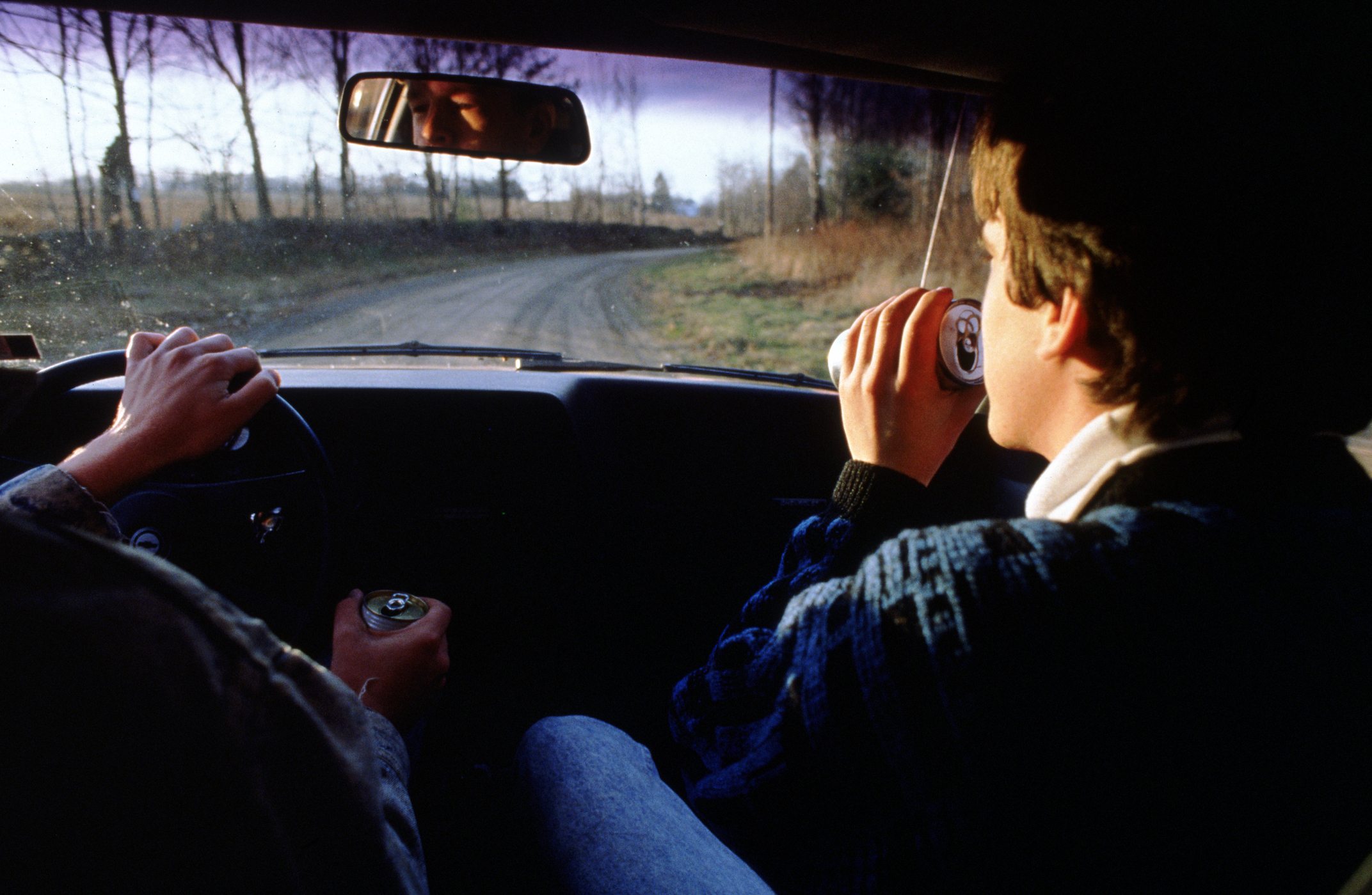 Two teens are drinking while driving