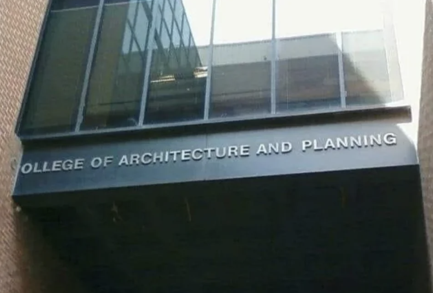 &quot;ollege of Architecture and Planning&quot; sign with the &quot;C&quot; missing because it&#x27;s not wide enough