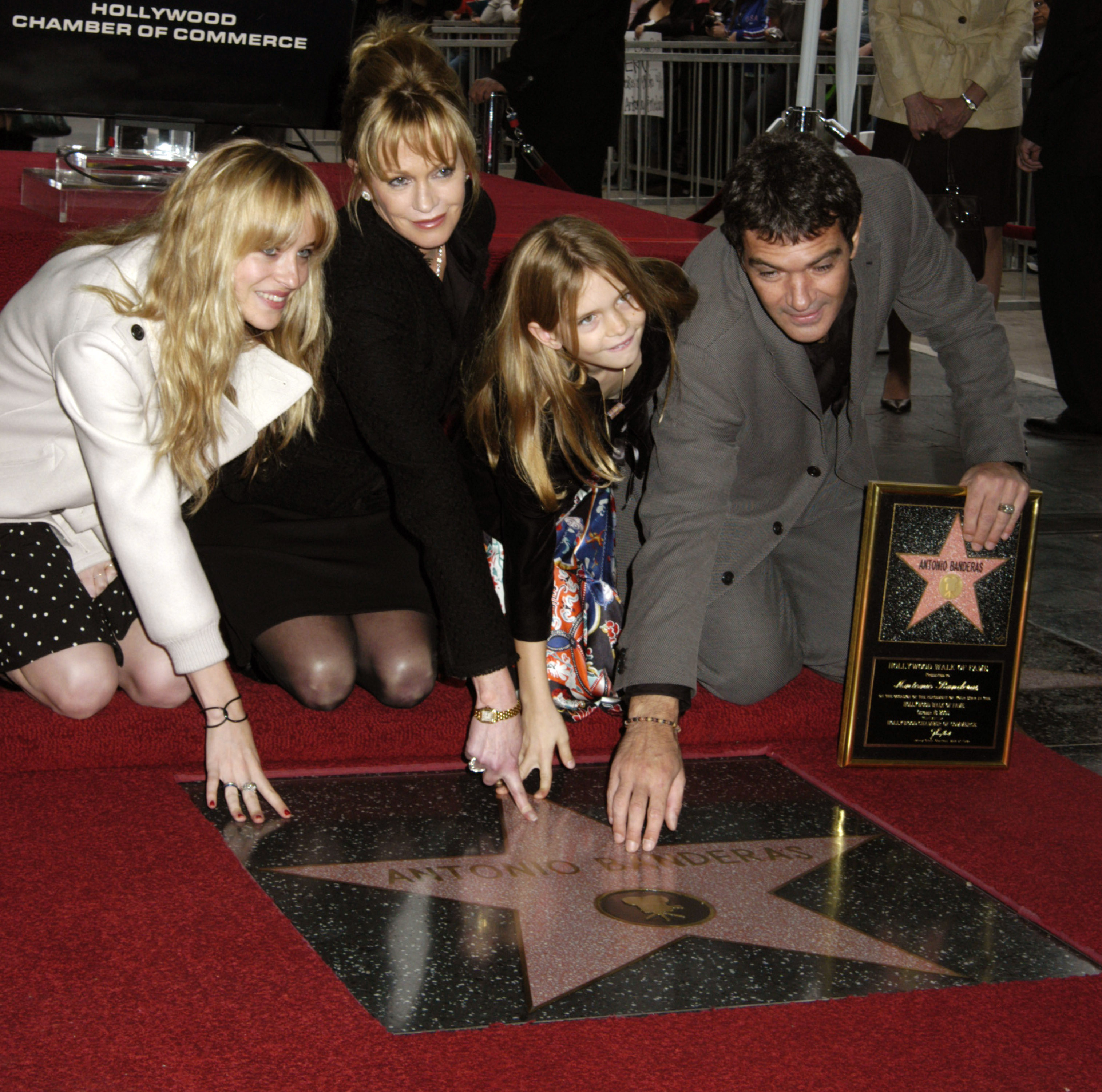 Close-up of Dakota with Antonio and Melanie and half sister Stella at his Hollywood Walk of Fame event