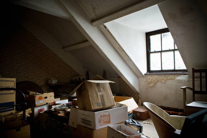 the attic of a home filled with old boxes