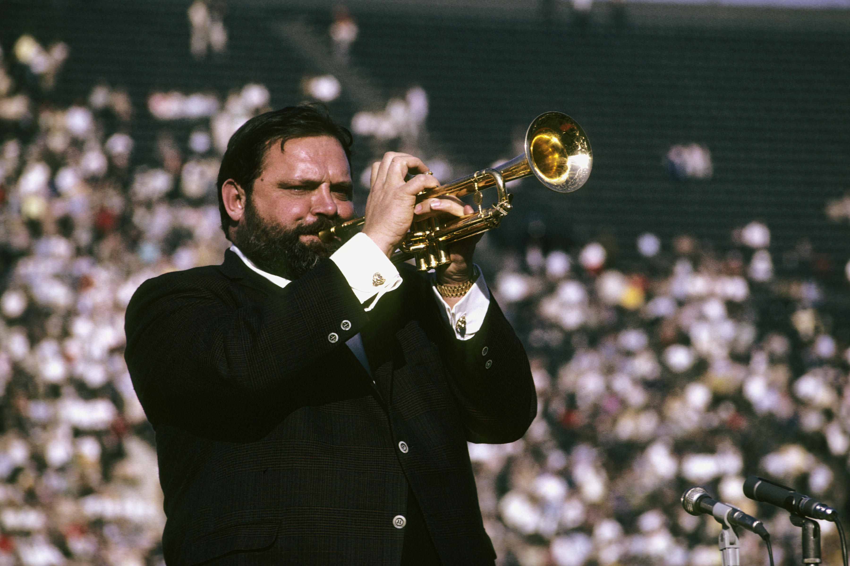 Closeup of Al Hirt performing at the Super Bowl