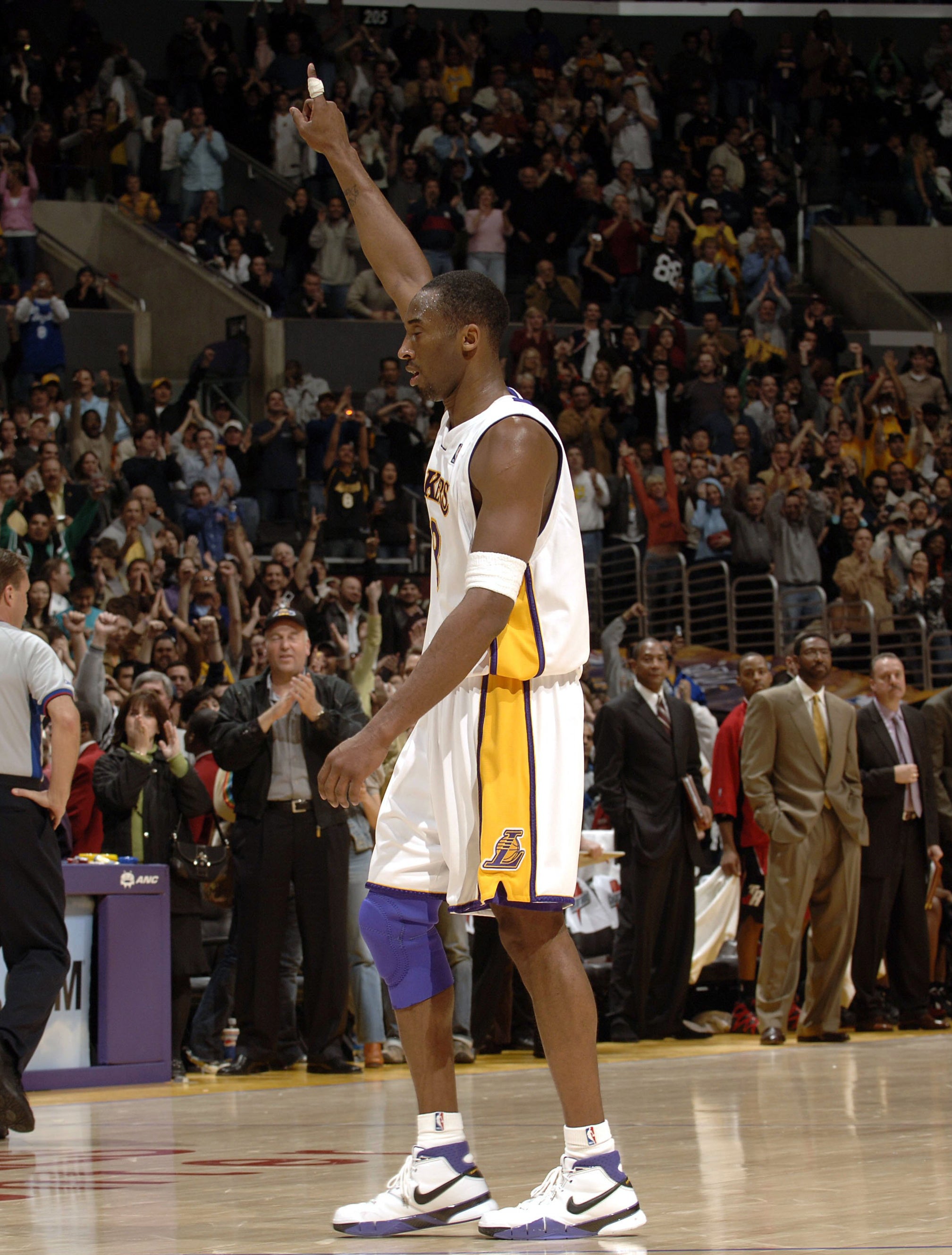Kobe Bryant #8 of the Los Angeles Lakers points in the air in a game he scored 81 points in against the Toronto Raptors on January 22, 2006 at Staples Center in Los Angeles, California.
