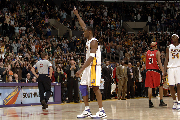 Kobe Bryant #8 of the Los Angeles Lakers points in the air in a game he scored 81 points in against the Toronto Raptors on January 22, 2006 at Staples Center in Los Angeles, California.