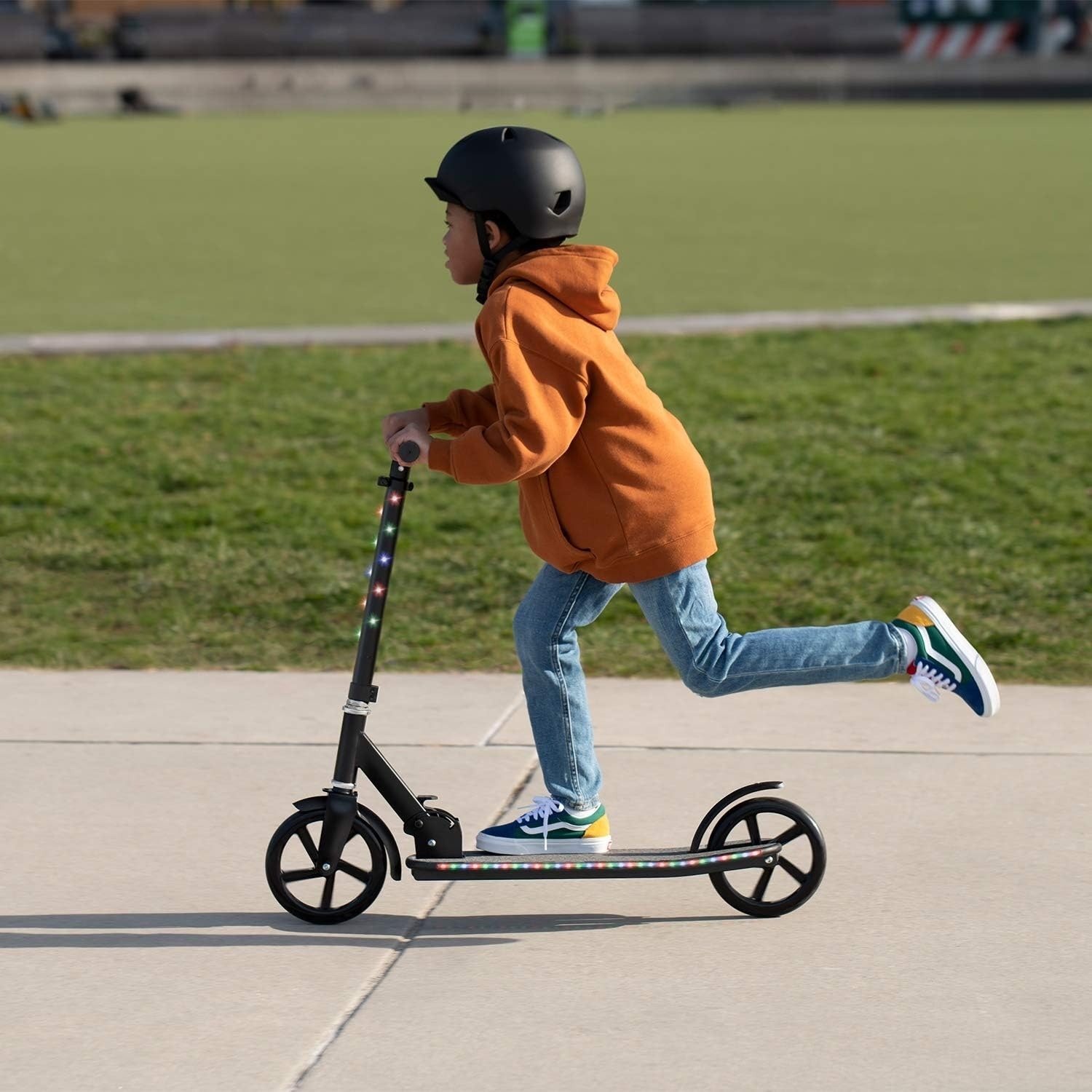 a child using the light up scooter