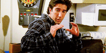 Man gesturing with hands, showing a confused expression