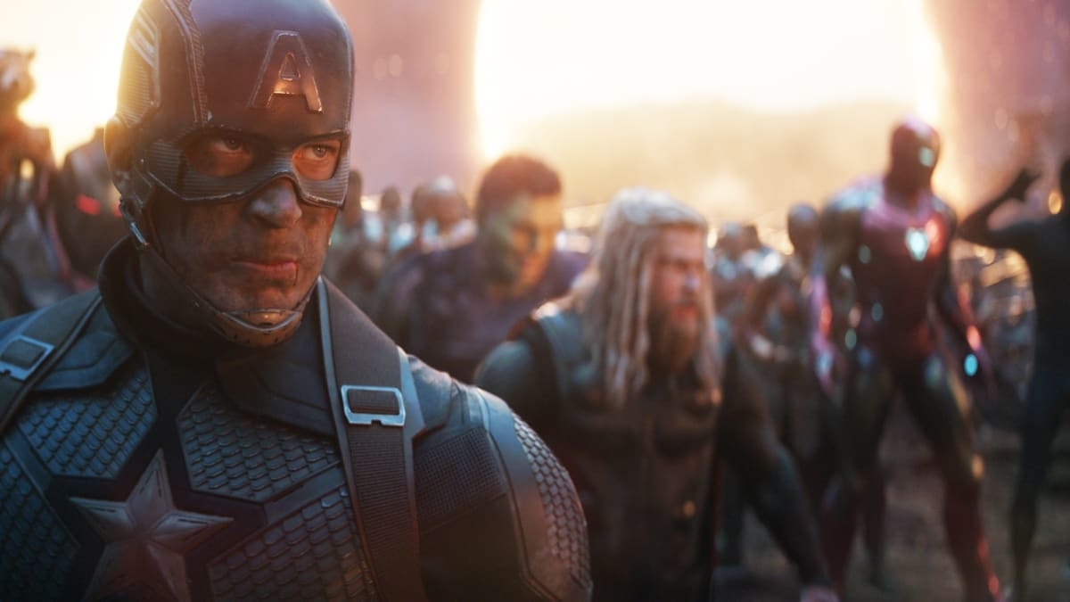 Captain America in the foreground with Thor, and Spider-Man behind him, ready for battle