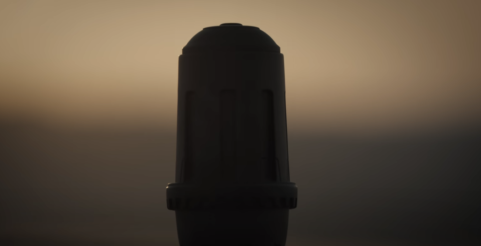 Silueta de un sable de luz con fondo de atardecer, alusivo a Star Wars