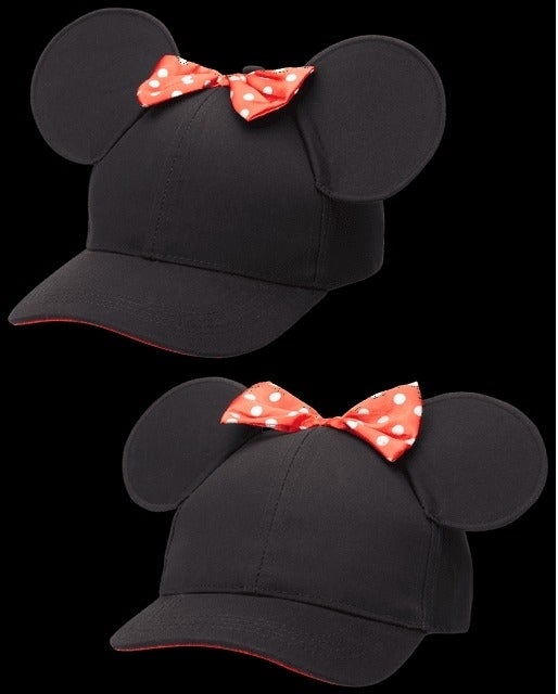 Two Mickey Mouse ear hats, one with a red and white polka dot bow, for a shopping article