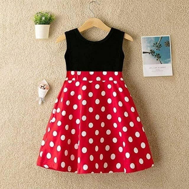 Red and white polka dot skirt with black top, sleeveless dress on display for shopping