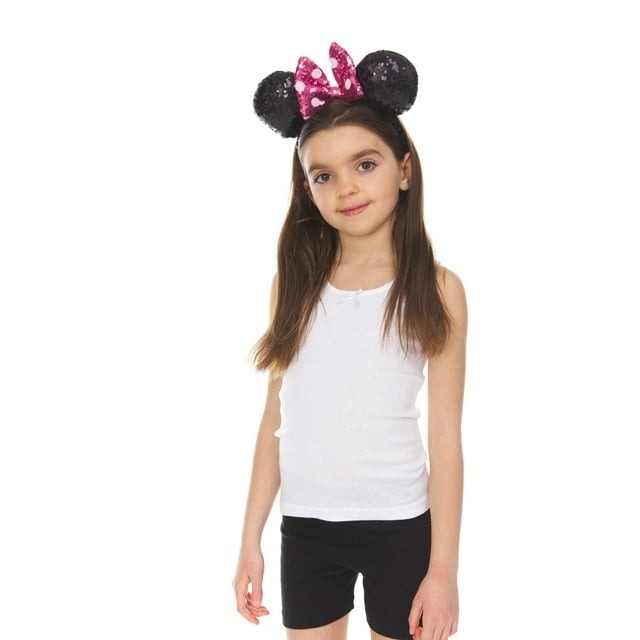 Child wearing Mouse ears headband with sequined bow; ideal for themed parties or dress-up