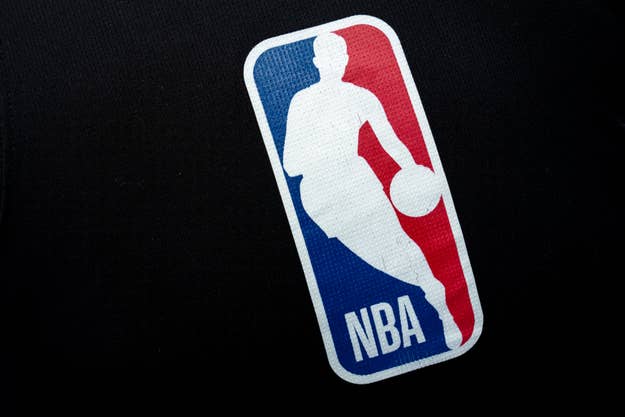 NBA logo with silhouette of a basketball player
